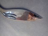 a reflection of a person in a mirror on the seat of a car