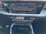 the dashboard of a car with a digital display in the center of it