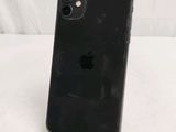 an apple iphone is sitting on top of a stand on a white surface