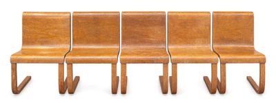 three wooden chairs are lined up against a white background