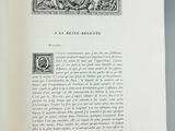 an open book with a picture of a man and a woman on it