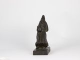 an image of a statue of a monk on a white background