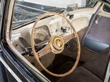 a steering wheel and dashboard of an old car