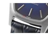 an image of a close up of a wrist watch with a blue dial