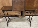 a small desk with a wooden top and metal legs
