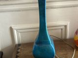 a lamp that is sitting on a table with a lamp on it