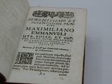 an open book with a black and white image of a man ' s face on it