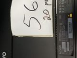 a piece of paper with writing on it sitting on a laptop