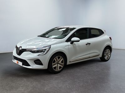 a white car in a white room with a black floor