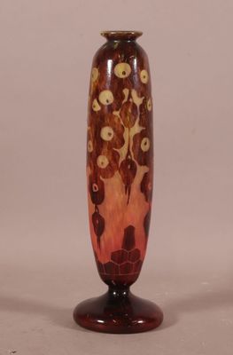 two vases that are sitting side by side on a table