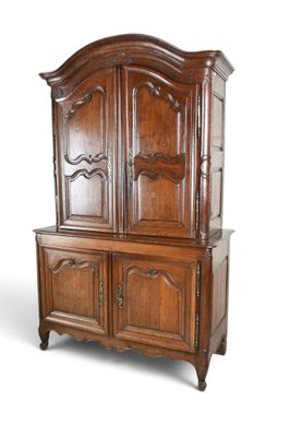 an image of a wooden cabinet with two doors and drawers