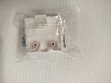 a plastic bag with a couple of plugs inside of it