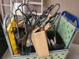 a cart full of items that are sitting on the floor