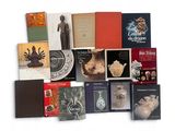 a lot of books that are sitting on a table