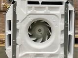 a white fan that is sitting on the floor