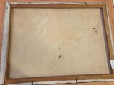 an image of a picture frame sitting on top of a wooden floor
