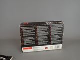 a box that is sitting on a table next to a book