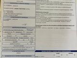 an image of a document with a picture of a car on it