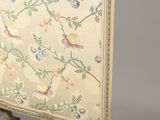 a small screen with a floral design on it