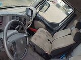 a car that has a steering wheel and a dash board