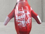 a large inflatable penguin that is standing on the ground