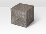 a gray wicker cube on a white surface with a white background