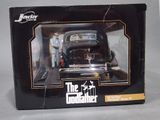 boxed picture of a black model of a car in a black box