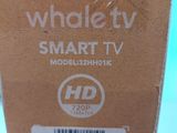 une boîte en carton sur laquelle est représentée une smart TV