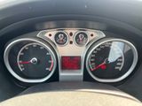 a close up of a car dashboard with a speedometer