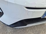 a close up of a car with a denting front bumper
