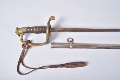 two swords and a knife on a white surface