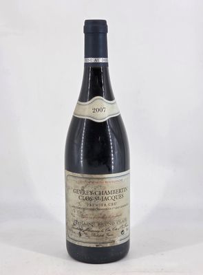 a bottle of wine that is sitting on a table