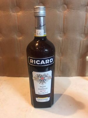 a bottle of wine that is sitting on a table