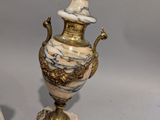 pair of antique marble and brass urns on marble pedestals