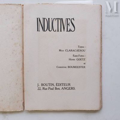 an old book that is open on a table
