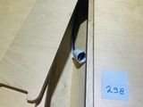a toothbrush sitting in a wooden box on a table