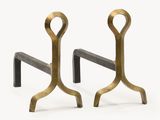 pair of brass and black iron bookends on a white background