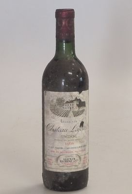 a bottle of wine that is sitting on a table