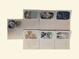 many cards with different designs on them on a table