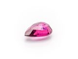 a close up of a pink diamond on a white background
