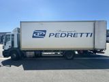 a delivery truck that is parked in a parking lot
