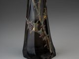 a glass vase with a star design on it