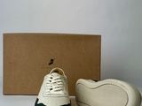 nike air force 1 ' s in white and green with a box in the background