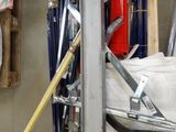 a picture of a garage with tools hanging on the wall