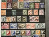 a picture of a display of stamps in a glass case