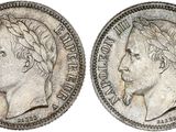 a silver coin with an image of a man ' s head on it