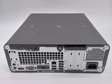 the back of a computer with a hard drive attached to it