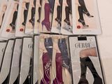 several pairs of women ' s thigh high stockings in various sizes and colors