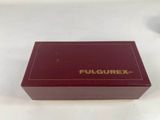 a close up of a red box with a gold logo on it