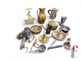 a lot of antique items that are on the table